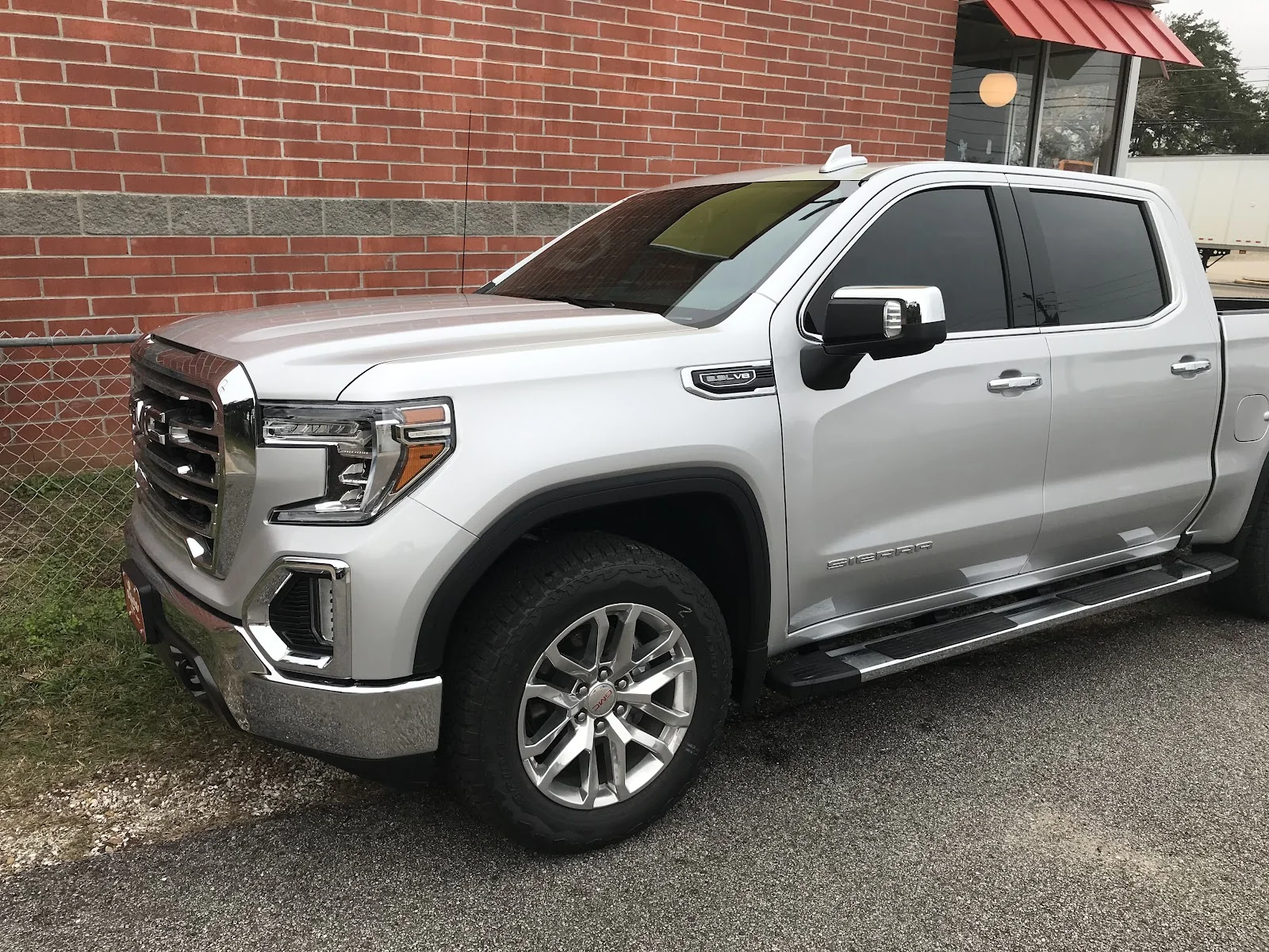 Inside Coastal Window Tinting — shop interior and work bay